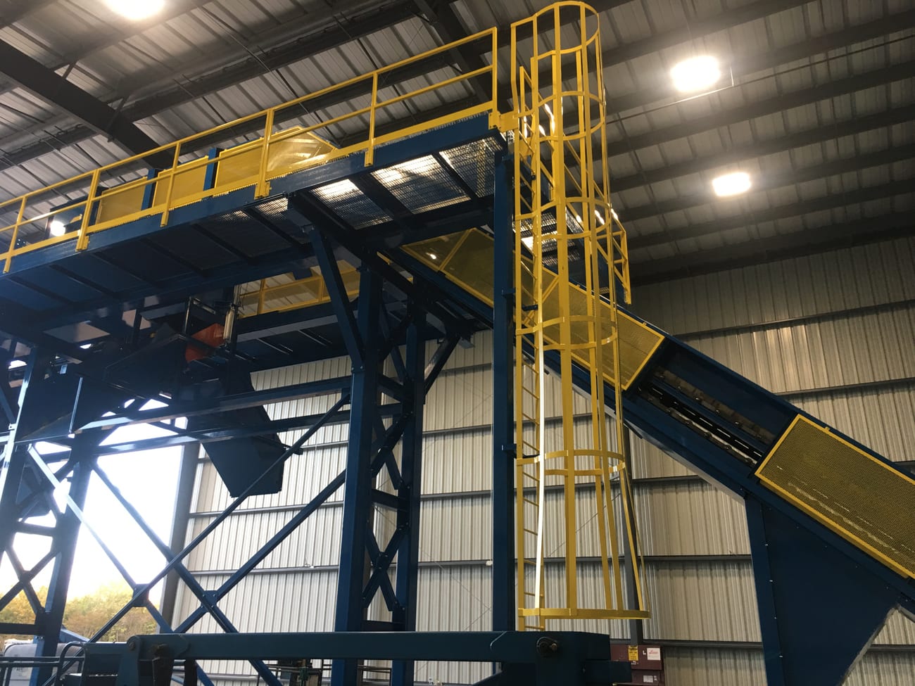 Custom Scrap Conveyor Systems | MC3 Manufacturing Inc.