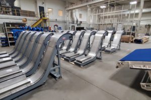 Magnetic Conveyors all lined up in a factory